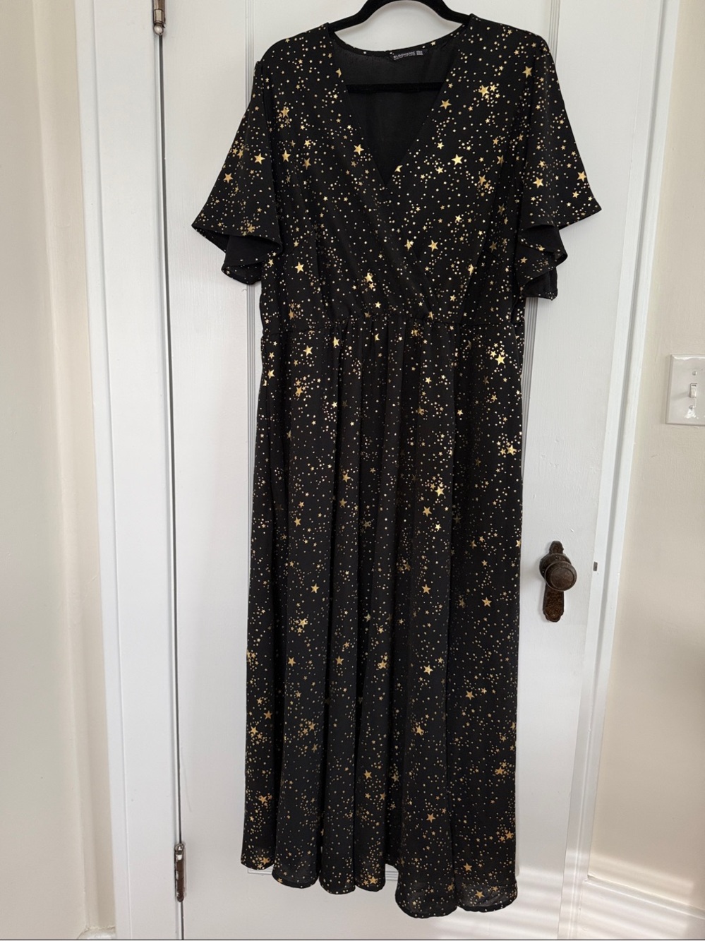 BloomChic Black Maxi Dress with Gold Star Print